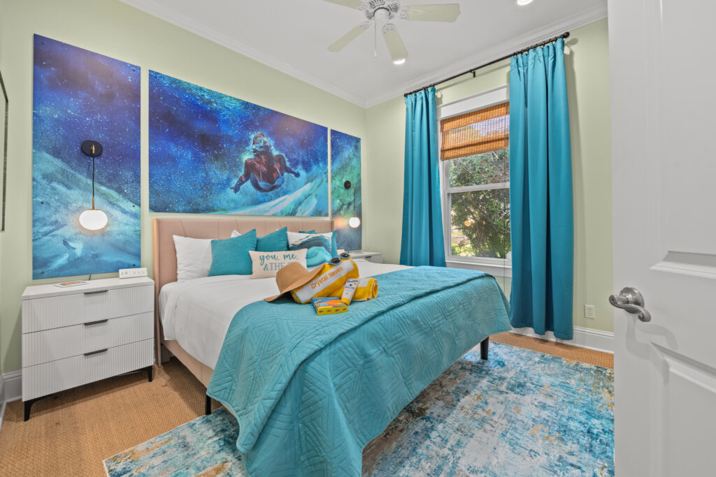 Bedroom 1 with surf artwork